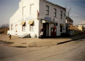 Dick Winking standing on the corner of the store in January of 1993.