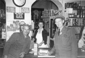 Dick Winkings business partner was his aunt Elsie Feld (middle). Two men in picture are Harry Hughes (left) and Frank Vansteele (right).