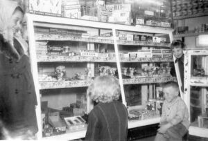 Winkings Market young customers checking out the tasty treats. Pictured are David Howe and Gloria Owsley (far right), Sharon Briscoe (far left), young girl with back to camera us unknown.