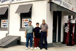 The Winking's in front of the store in October 1995 - Frank (left), June (middle) and Dick (right).