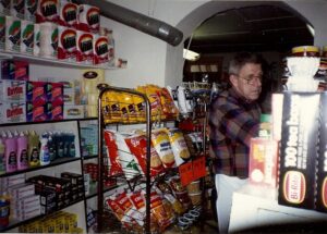 Dick Winking stocking shelves in January 1993.